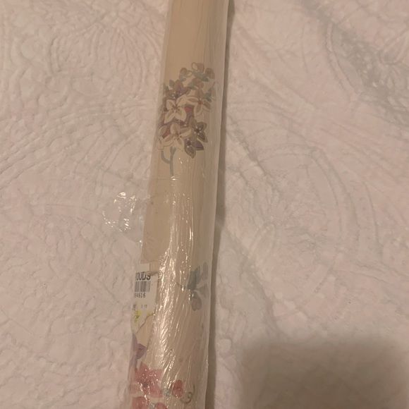 Never used Wallpaper. Beige floral design.
